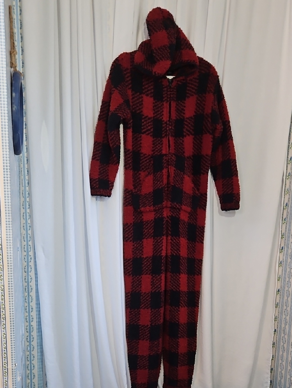 SKIMS Cozy Knit Unisex Onesie in the red and black "Brick Buffalo Check" pattern - Picture 3 of 6